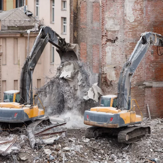 two cranes at the building demolition site by Multidemolition Malaysia