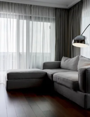 dark living room ambiance with sheer blinds