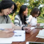 group of concentrated secondary school students studying for A-Levels in Malaysia