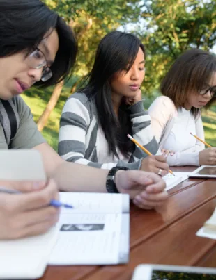 group of concentrated secondary school students studying for A-Levels in Malaysia