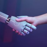 artificial intelligence robot shaking a human's hand