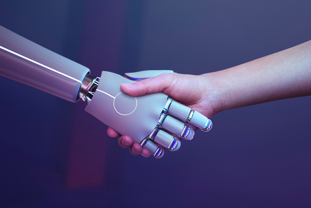 artificial intelligence robot shaking a human's hand