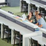 Three A-level students in a classroom