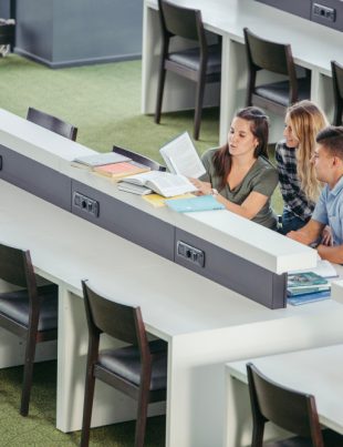 Three A-level students in a classroom