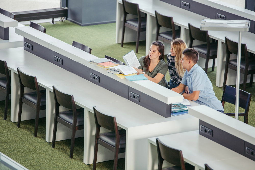 Three A-level students in a classroom