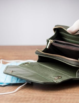 woman holding an empty wallet