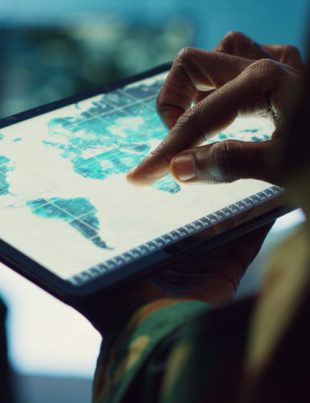 A person looking at data in a tablet