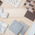 Bathroom wall and floor tile design along with other materials displayed, featuring various colors and textures.