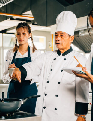 professional asian senior chef teaches in culinary academy of culinary chef course in kl malaysia