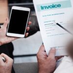 Employees utilizing the new e-invoicing implementation system in Malaysia.
