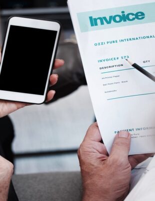 Employees utilizing the new e-invoicing implementation system in Malaysia.