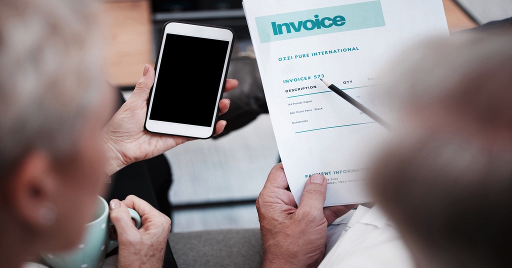 Employees utilizing the new e-invoicing implementation system in Malaysia.