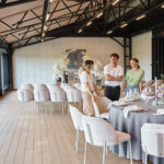 A couple talking to the manager at the top event space in Subang Jaya.