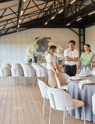 A couple talking to the manager at the top event space in Subang Jaya.