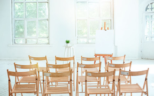 Rows of neatly arranged chairs at an event space in Subang Jaya.