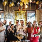 A lively group enjoying a festive moment inside the top event space in Subang Jaya.