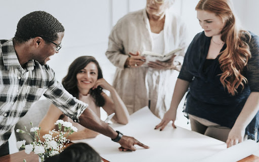 Team collaborating on event details at a top event space in Subang Jaya. 