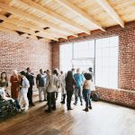 A group of people crowded in the top event space in Subang Jaya