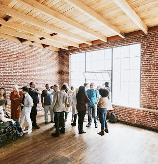 A group of people crowded in the top event space in Subang Jaya