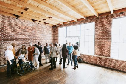 A group of people crowded in the top event space in Subang Jaya