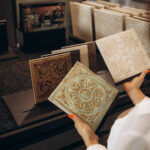 Various decorative wall and floor tiles on display in Selangor showroom, showcasing options and price from a building material supplier in Malaysia.