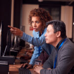 A woman teaches diploma computer systems and networking