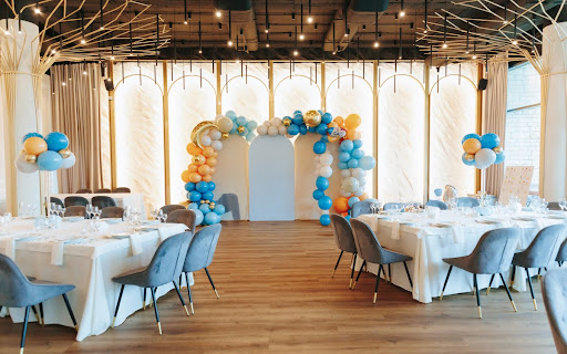 A beautifully set-up birthday party with a custom balloon arch at a top event space in Subang Jaya.